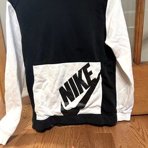 Nike XL hoodie with NIKE across the top of the hood and on front pocket